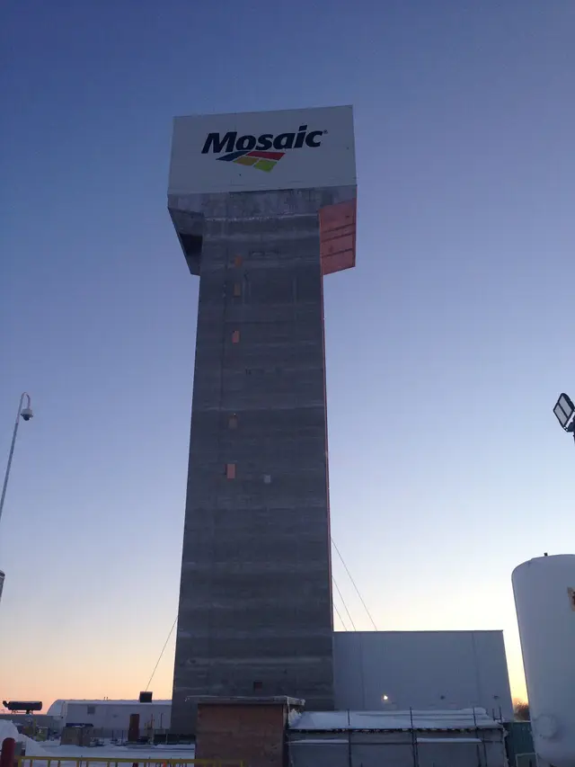 Mosaic K3 mine north shaft headframe at dusk